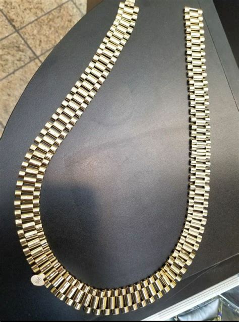 14k gold rolex chain.